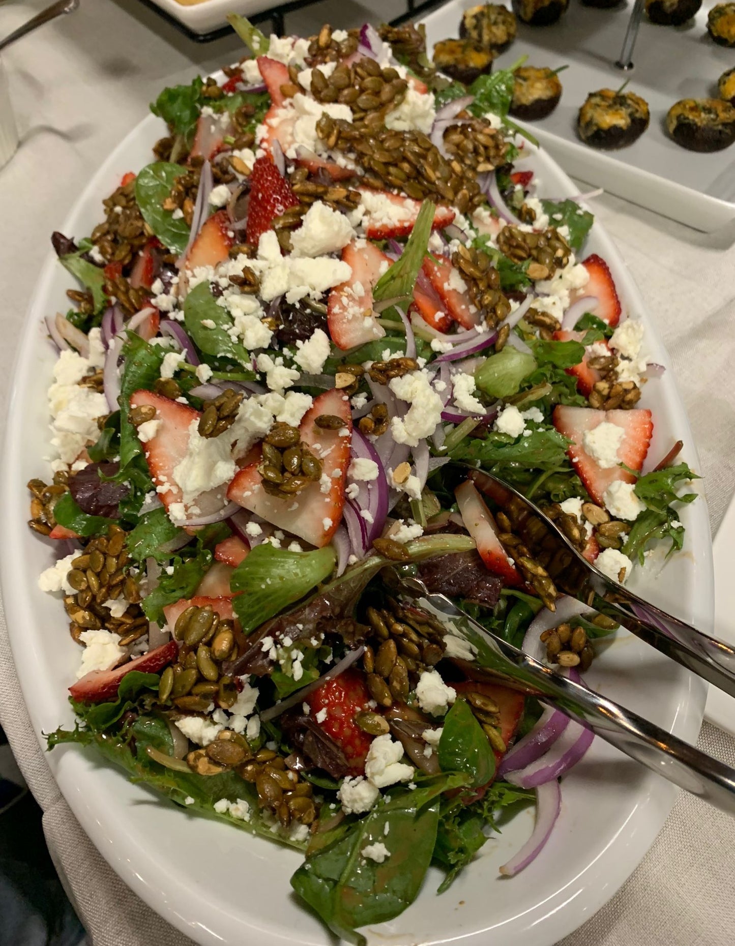 Candied Pumpkin Seeds, Spring Mix, Goat Cheese, Strawberries, Shaved Red Onions +Maple Balsamic Dressing